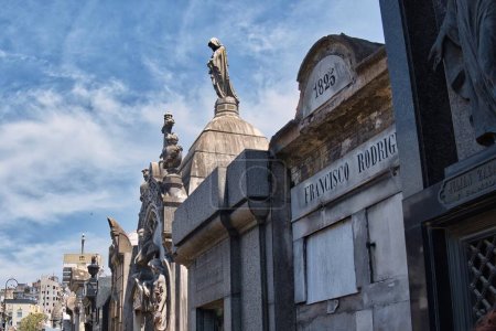 Photo for Buenos aires, argentina - 28 October 2022: close up of one of the world famous landmark the La Recoleta cemetery with historic monumental graves with sculptures an architectural wonder - Royalty Free Image