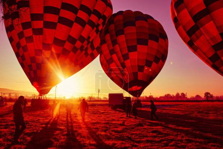 Photo for Napa, United States - February 17 2013 : early in the morning the departure of a hot balloon ing journey - Royalty Free Image