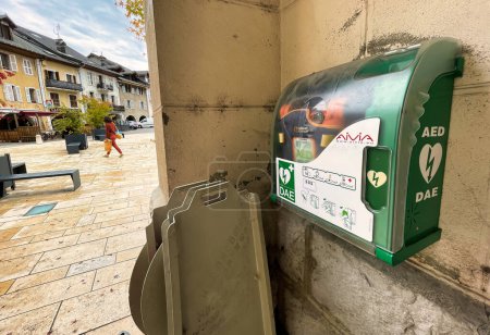 Photo for Thones, France - October 04 2021 : a green cpr box with instruments to give heart massage in case of emergency on a public street - Royalty Free Image