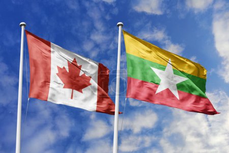 Ilustración 3d. Bandera de Canadá y Myanmar ondeando en el cielo. Alta bandera ondeante detallada. Representación 3D. Saludando en el cielo. Banderas ondeaban en el cielo nublado.
