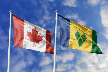 Ilustración 3d. Canadá y San Vicente y las Granadinas Bandera ondeando en el cielo. Alta bandera ondeante detallada. Representación 3D. Saludando en el cielo. Banderas ondeaban en el cielo nublado.