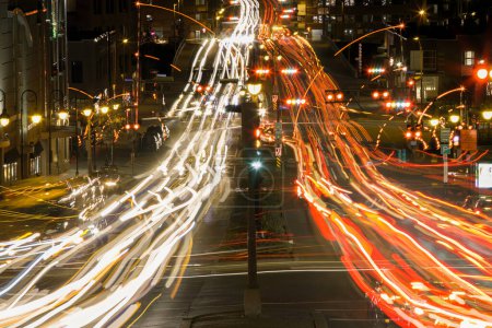 Photo for Rush hour traffic time lapse Sherbrooke city Quebec Canada urban motion speed street long lights exposure - Royalty Free Image