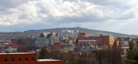 Small city Sherbrooke Estrie Quebec Eastern Townships Canada downtown mountain with clouds skyline