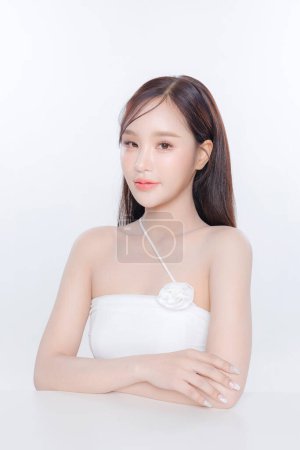 Photo for Young Asian woman long hair with clean fresh skin Korean makeup on white background, Female model Face care, Facial treatment, Cosmetology, beauty and spa, Asian women portrait. - Royalty Free Image