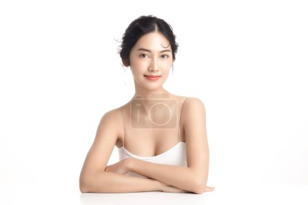 Photo for Asian woman with a beautiful face and Perfect clean fresh skin. Cute female model with natural makeup and sparkling eyes on white isolated background. Facial treatment, Cosmetology, beauty Concept. - Royalty Free Image