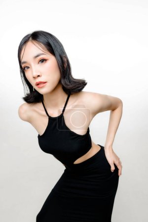 Photo for Fashionable asian woman short hair with Perfect body. Cute female model with natural makeup and sparkling eyes on white isolated background. Facial treatment, Cosmetology, beauty Concept. - Royalty Free Image