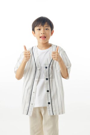 Photo for Happy Asian little boy trump up from happiness isolated on white background, Excited kid success concept, Looking at camera and full body composition. - Royalty Free Image