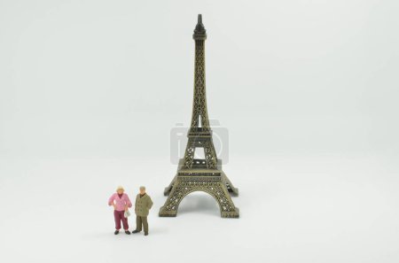 Photo for The Eiffel tower Paris with small figure - Royalty Free Image