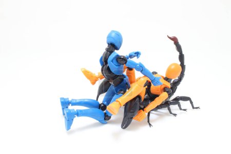 Photo for A puppets have sex on the scorpion chair - Royalty Free Image