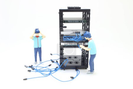 Photo for The IT Engineer in Action Configuring Servers - Royalty Free Image