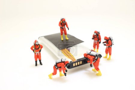 Photo for A mini chemical team checking the battery expand - Royalty Free Image