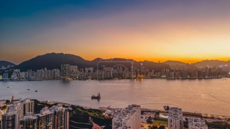 Photo for Nov 18 2023 - Hong Kong: east of the Victoria Harbour at Kwun Tong, Hong Kong, sunset view - Royalty Free Image