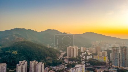 Photo for Dec 24 2023 City skyline with beautiful sunset over mountains - Royalty Free Image