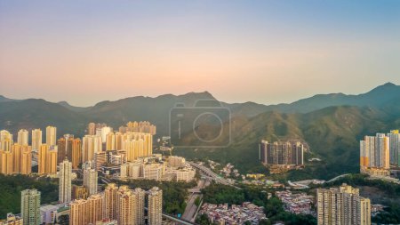 Photo for Dec 24 2023 City skyline with beautiful sunset over mountains - Royalty Free Image
