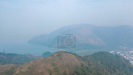 Photo for Dec 30 2023 Beauty in Nature with Serene Foggy Ridge - Royalty Free Image