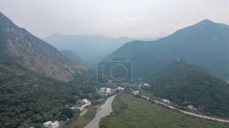 Photo for Dec 30 2023 a mountainous landscape with a reservoir and river - Royalty Free Image