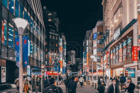 Photo for Busy Downtown Metropolis at Night, Ikebukuro, Japan Nov 28 2023 - Royalty Free Image