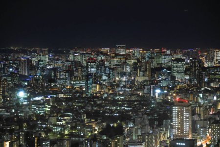 Photo for Bustling urban metropolis with illuminated buildings. Nov 28 2023 - Royalty Free Image