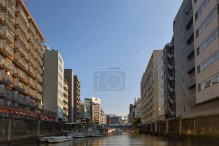 Photo for Nov 27 2023 City skyline with buildings and waterway reflecting the sky. - Royalty Free Image