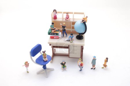 Photo for The scale of the student desk with children - Royalty Free Image