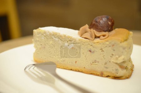 Photo for The white plate of a Castanea Cheesecake - Royalty Free Image