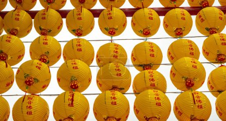 Yellow lanterns at the landmark Longshan Buddhist Temple in Taipei