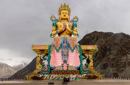 Large, colorful Buddha statue at the historic Diskit Buddhist Monastery in the Nubra Valley in northern India