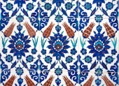 Iznik lapis tiles with tulip pattern on an interior wall of Rustem Pasha Mosque in Istanbul, Turkey. Poster #620442330