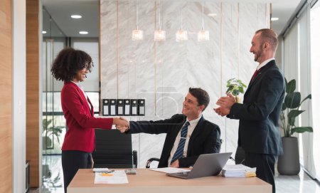 Photo for Business holding hands, businessmen are agreeing on business together and shaking hands after a successful negotiation. Handshaking is a or congratulation. - Royalty Free Image