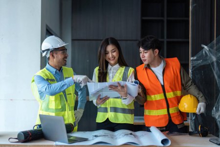 Photo for Team of engineer and architects working, meeting, discussing, designing, planning, measuring layout of building blueprints at construction site, Construction concept. - Royalty Free Image