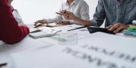 Photo for Close up business people meeting to discuss the situation on the market. Business team analyzing income charts and graphs. Business Financial Concept. - Royalty Free Image
