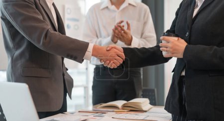 Photo for Young asian business shaking hands successful making a deal, business woman handshake. Business partnership meeting handshake concept. - Royalty Free Image