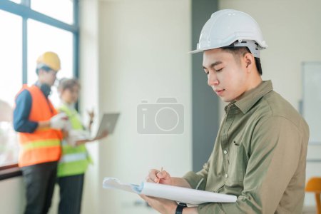 Photo for Engineer planing and working on table construction working at office and engineering team discussion background image. - Royalty Free Image
