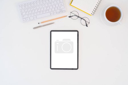 Photo for Modern desk workspace with blank copy space mockup with blank screen tablet, coffee cup, technology, headphones with equipment other office top view freelance business concept for social media. - Royalty Free Image