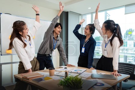 Photo for Business team celebrate corporate victory together in office, laughing and rejoicing, smiling excited employees colleague screaming with joy in office. - Royalty Free Image