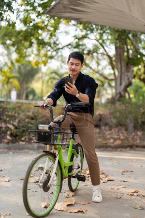 Photo for Businessman and bicycle in city to work with eco friendly transport. bike and happy businessman professional talking, speaking and telephone discussion while on in urban street. - Royalty Free Image