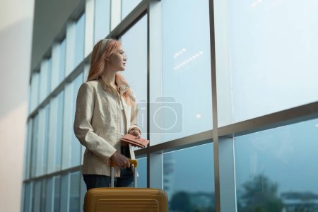 Photo for Airport travel and woman with passport, flight ticket or information of immigration, journey and luggage. identity document and international registration. - Royalty Free Image