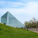 SAPPORO, JAPAN - 05 MAY 2024 : The symbol of Moerenuma park, the glass pyramid Hidamari, on February 5 in Sapporo. The glass pyramid is multi-purpose space, such as cultural activities and museum.