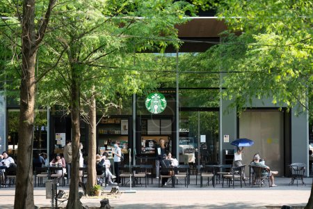 Photo for Taipei Taiwan - April 28, 2024 : Starbucks coffee logo in front of the shop. - Royalty Free Image