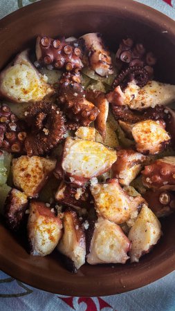 Photo for Galician Style Octopus with Paprika Potatoes - Royalty Free Image