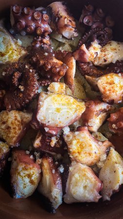 Photo for Galician Style Octopus with Paprika Potatoes - Royalty Free Image