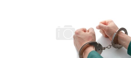 Photo for Handcuffed hands on isolated white, closeup with copy space - Royalty Free Image
