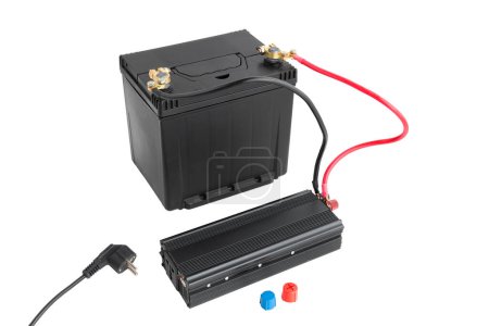 Foto de Power inverter connected to a car battery, 12v DC to AC converter 220v, on isolated white - Imagen libre de derechos