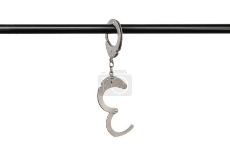 Photo for Opened handcuffs fastened to a pipe, liberation concept, cut out, isolated on a white background. - Royalty Free Image
