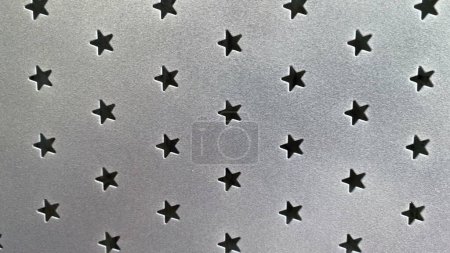 Foto de Textura superficial metálica con pequeñas estrellas - Imagen libre de derechos