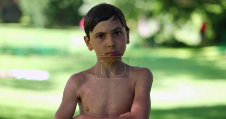 Photo for Child negative emotion rejecting offer. Young boy shaking head and waving finger saying NO - Royalty Free Image