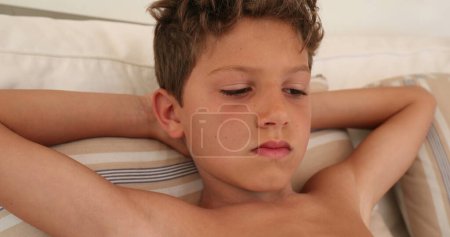 Photo for Child face thinking contemplating. Thoughtful pensive young boy - Royalty Free Image
