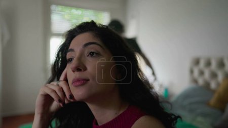 Photo for Couple in crisis. Young woman rolling eyes listening to male partner screaming in background angry about broken relationship - Royalty Free Image