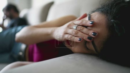 Photo for Stressed young woman covering face with shame and mental pressure. Female person 30s suffering from emotional pain. Worried expression - Royalty Free Image