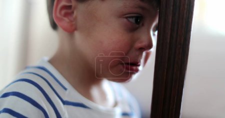 Photo for Child crying tearful kid wiping tears feeling upset grounded boy - Royalty Free Image
